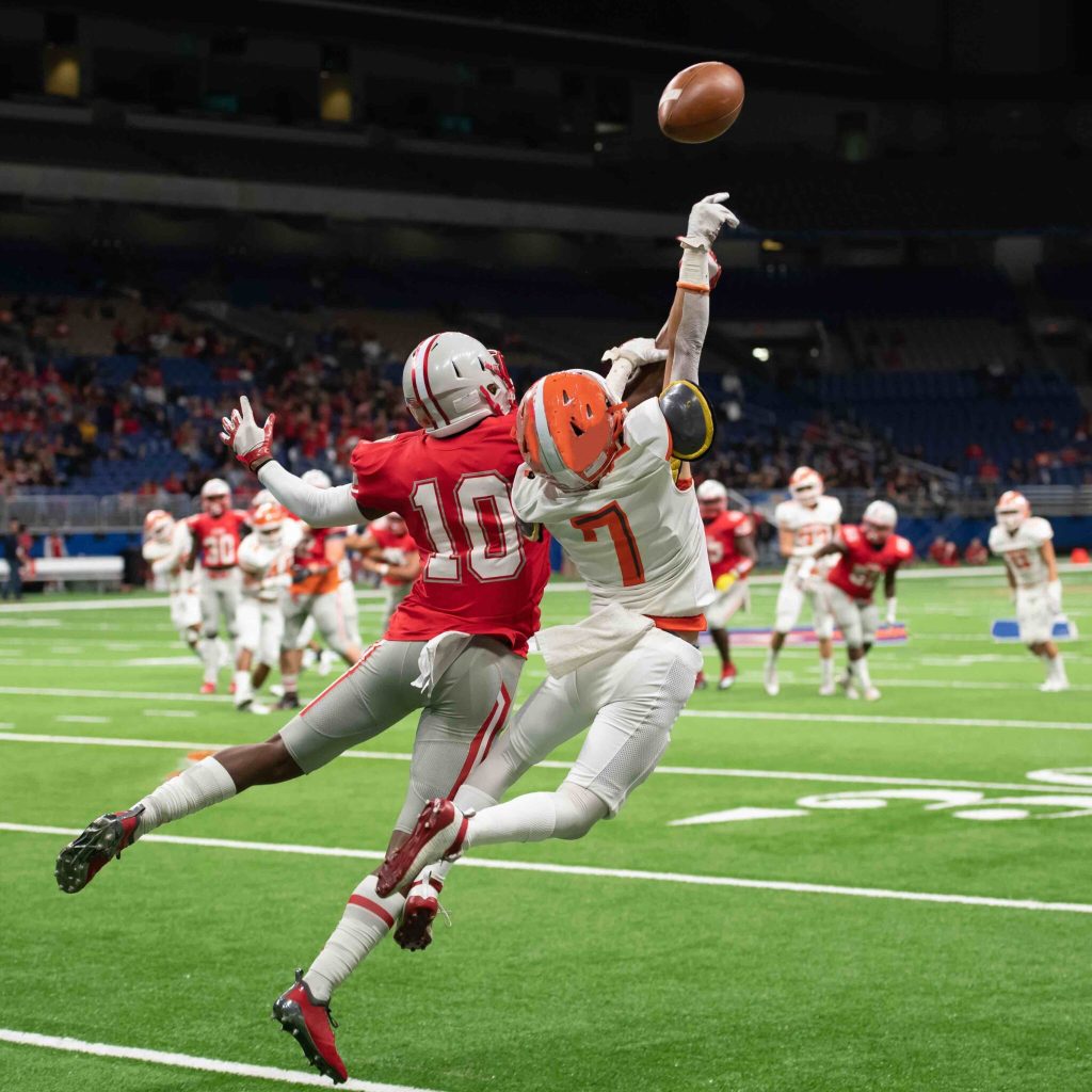 Great action photos of high school football players making amazing plays during a football game